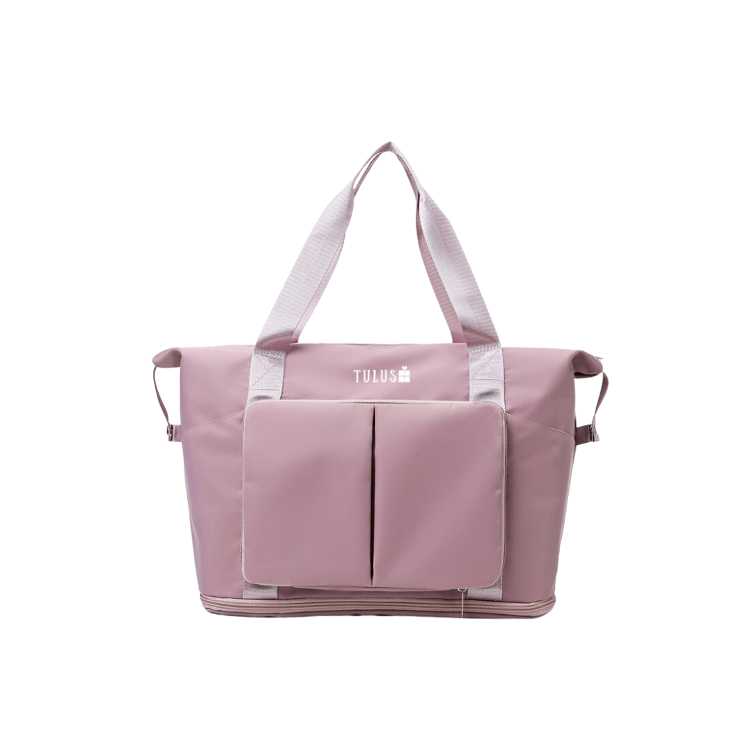 Foldable, expandable and waterproof tote and travel bag in mauve, spacious, accessible pockets with wet and dry compartments.