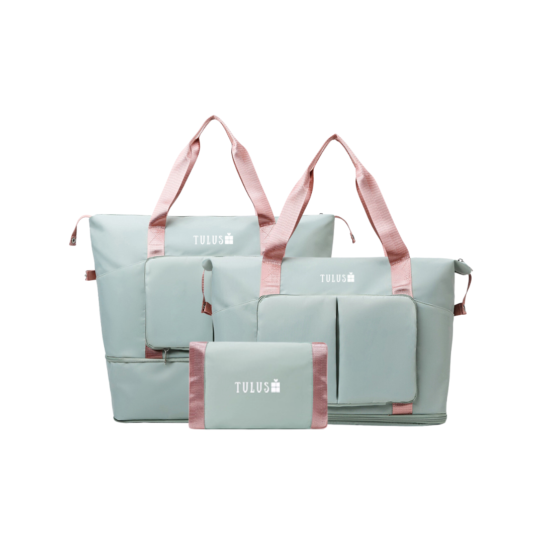 Foldable, expandable and waterproof tote and travel bag in light green with pink handles, spacious, accessible pockets with wet and dry compartments.